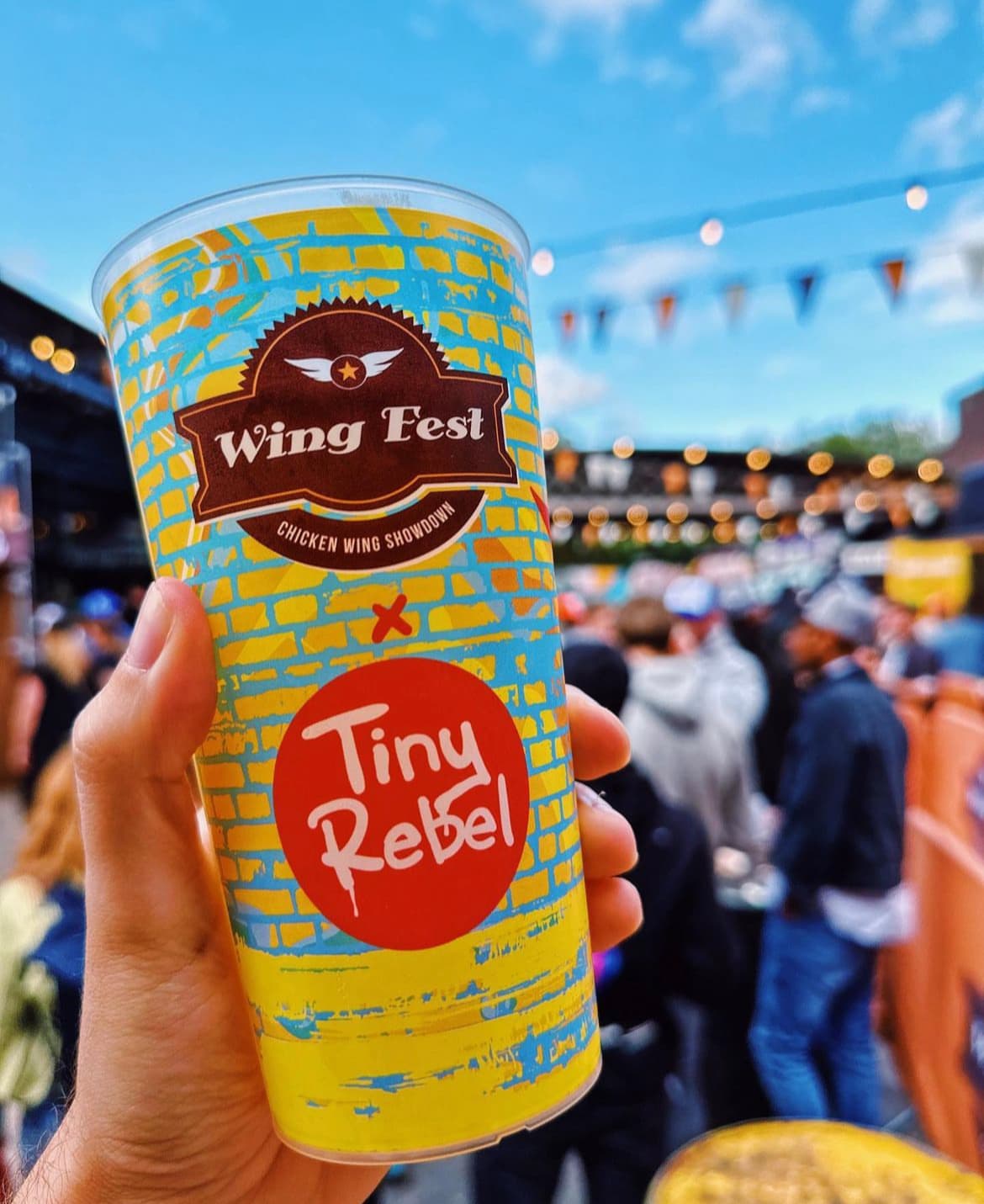 A stack of plastic pint cups in a UK manufacturing setting
