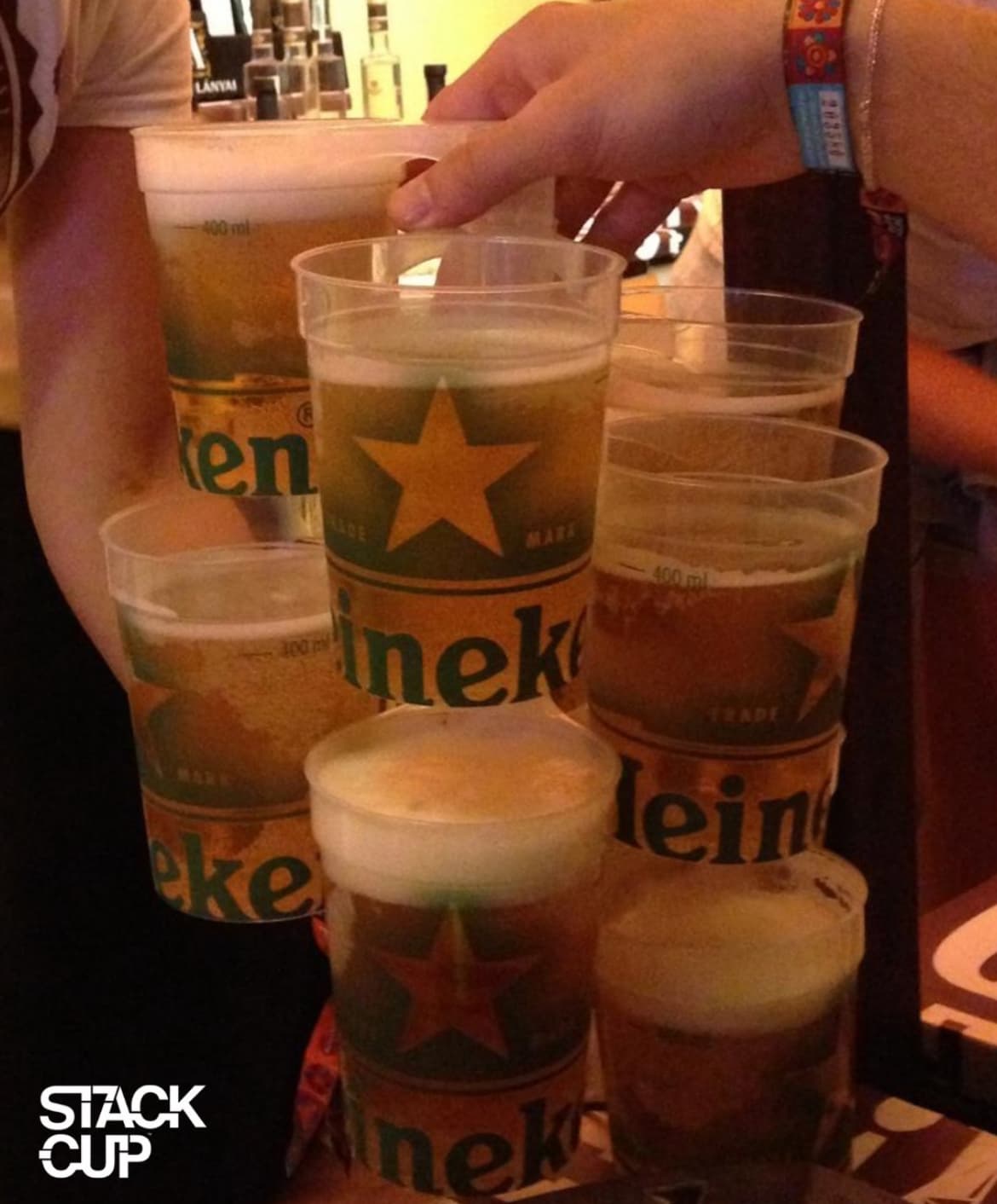 Clean reusable cups packed carefully into ventilated plastic storage crates