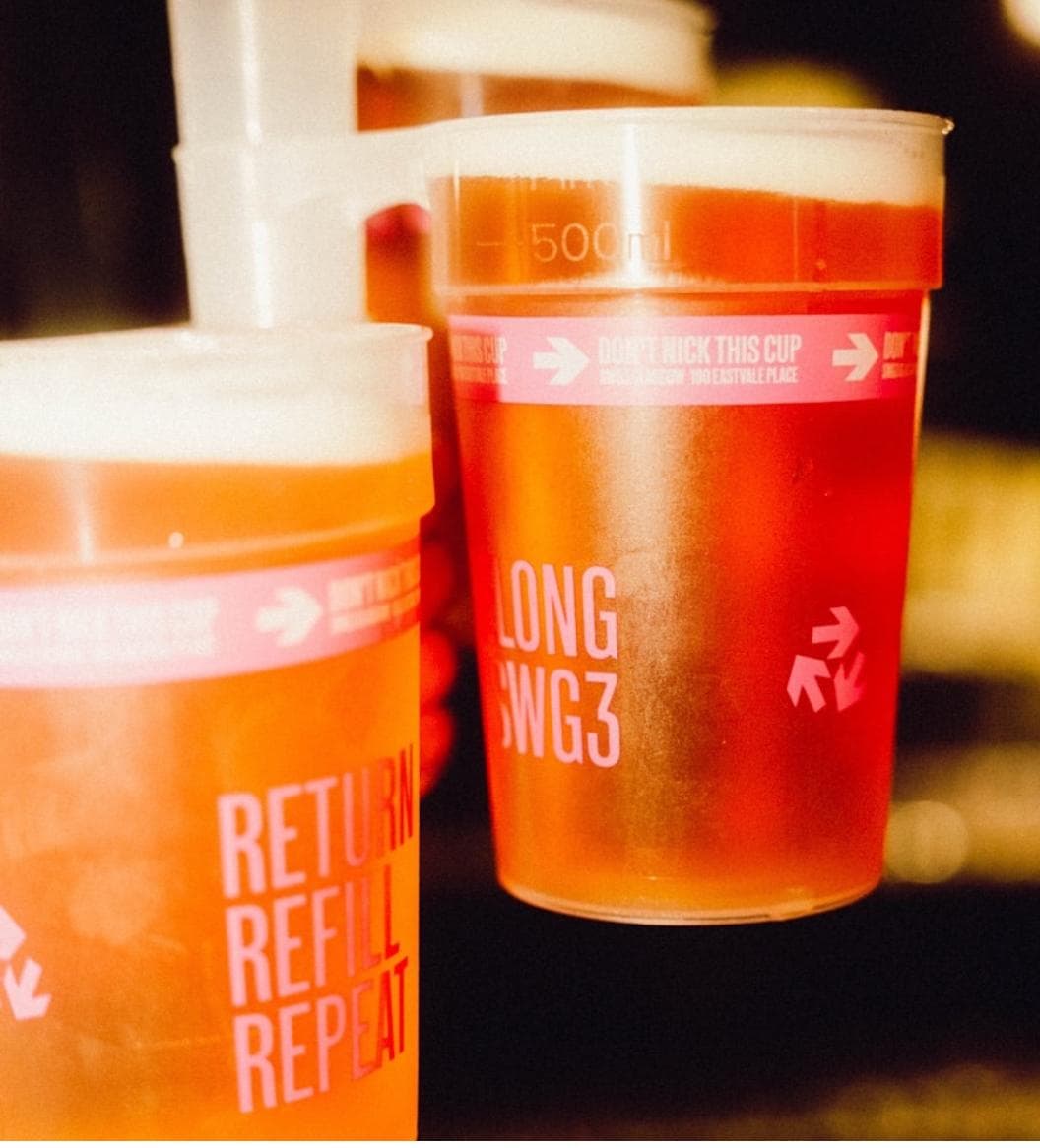 Festival goers with eco cups