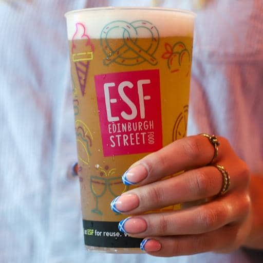 Custom printed cups at a stadium event