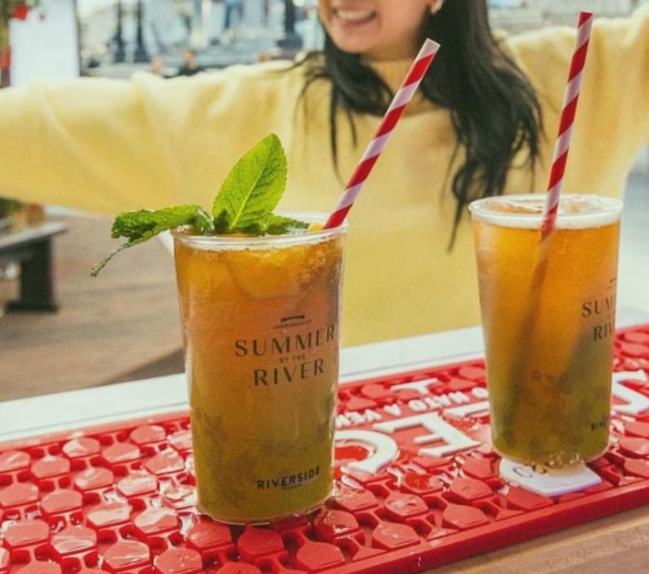 UKCA-marked reusable cups being used at a bar
